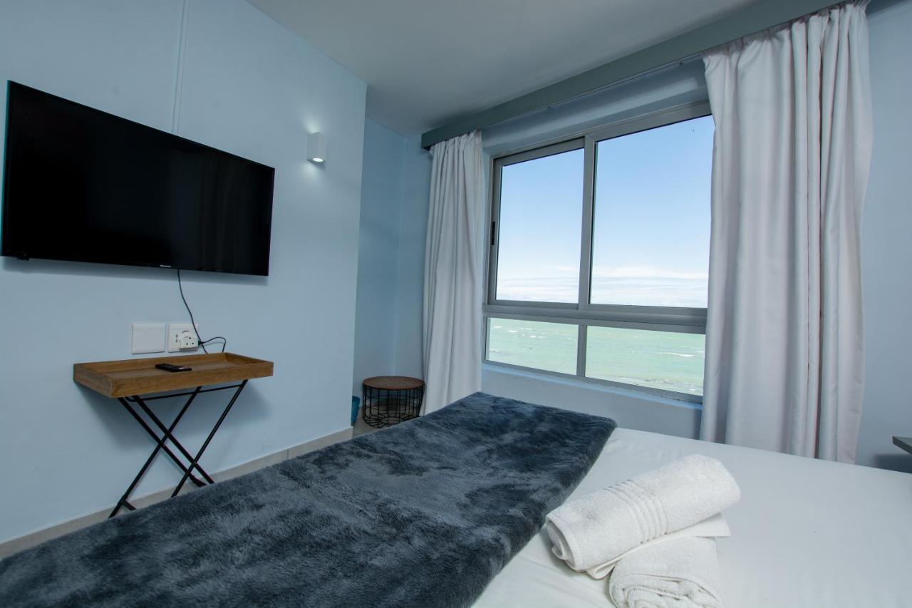 Ocean Breeze Hotel Strand Exteriör bild